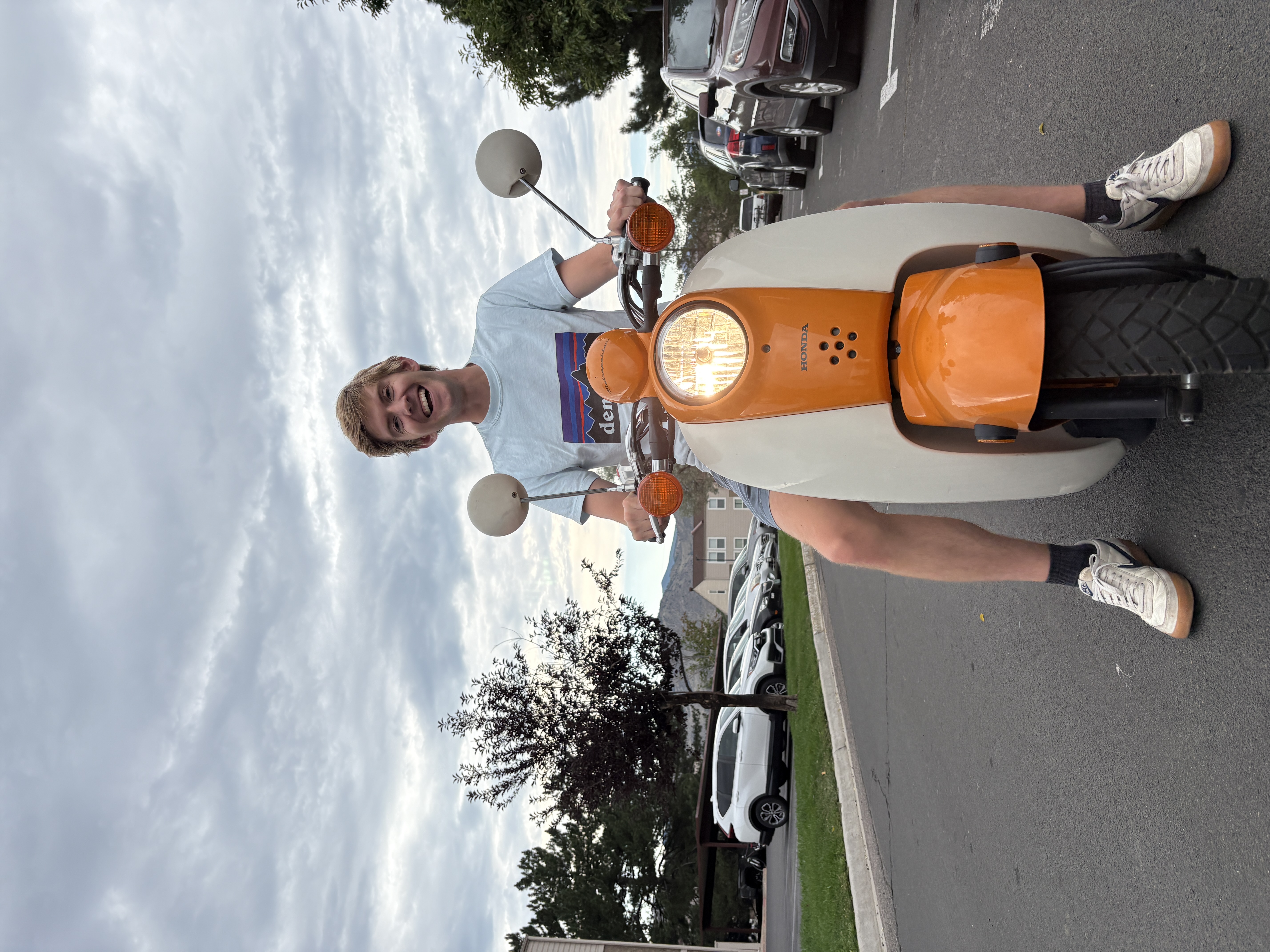 Cruising on the orange scooter